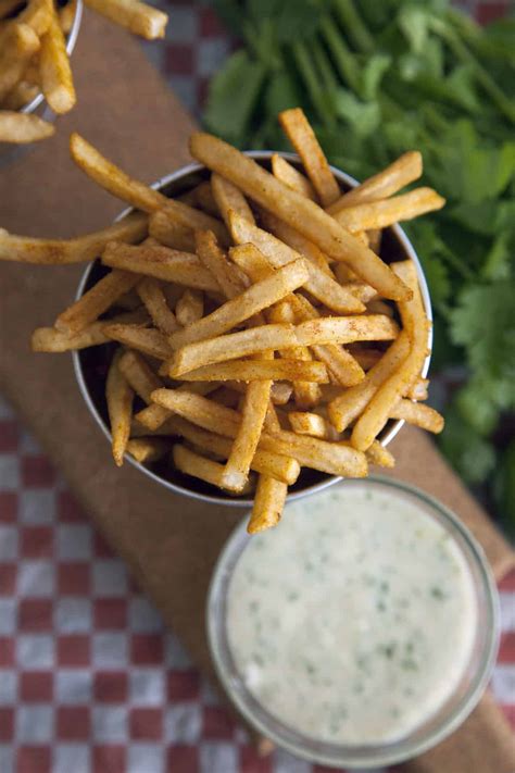 curry-fries-with-coconut-lime-dip-easy-vegan image