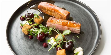 crispy-duck-breast-and-leg-with-cherries image