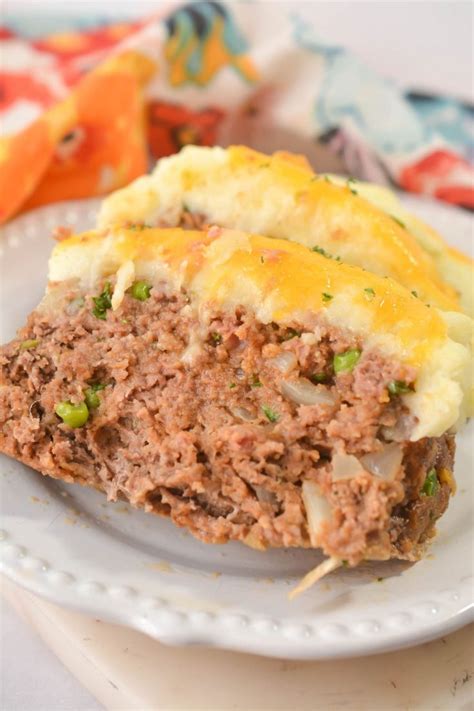 meatloaf-with-mashed-potatoes-and-cheese image