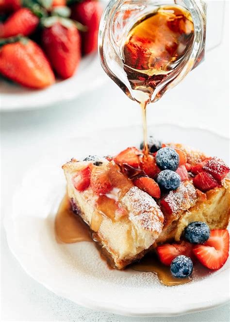 croissant-french-toast-bake-with-berries-striped-spatula image