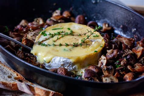 baked-brie-with-garlic-butter-mushrooms-smitten-kitchen image