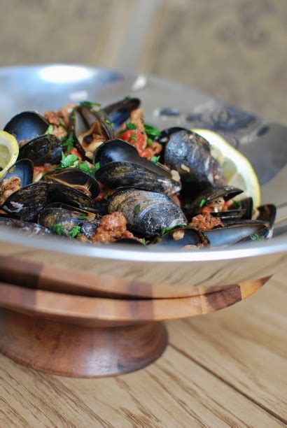 spicy-mussels-with-andouille-sausage-tasty-kitchen-a image