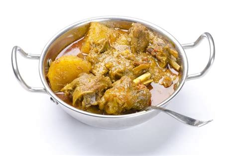 curried-goat-recipe-taste-the-islands image