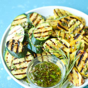 grilled-garlic-herb-zucchini-damn-delicious image