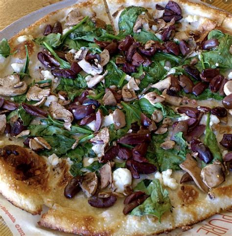 mushroom-spinach-white-pizza-recipe-countertop image