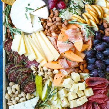 how-to-make-a-meat-and-cheese-board-damn-delicious image