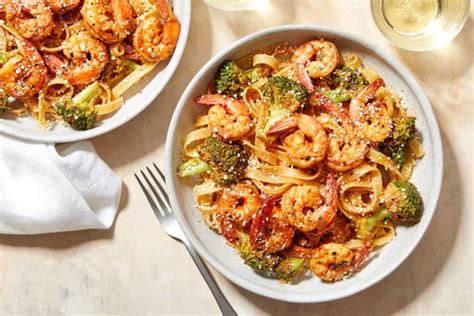 recipe-spicy-shrimp-pasta-with-garlic-broccoli-blue image