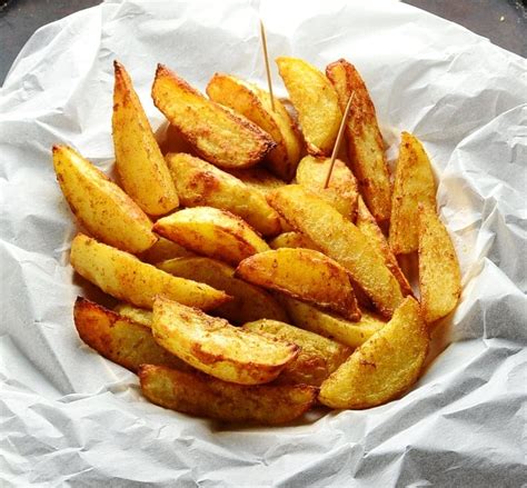 homemade-spiced-potato-wedges-baked-everyday image