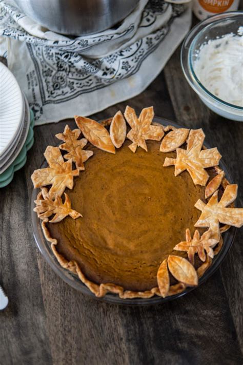 smoked-pumpkin-pie-with-eggnog-whipped-cream image