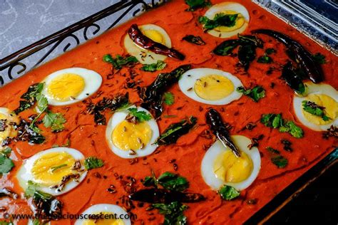 tomato-curry-with-eggs-the-delicious-crescent image