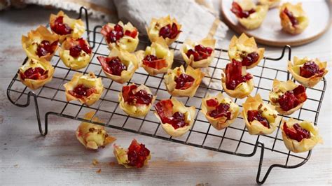 brie-bacon-and-cranberry-filo-bites-recipe-bbc-food image