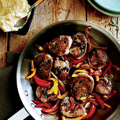 pork-tenderloin-with-red-and-yellow-peppers image