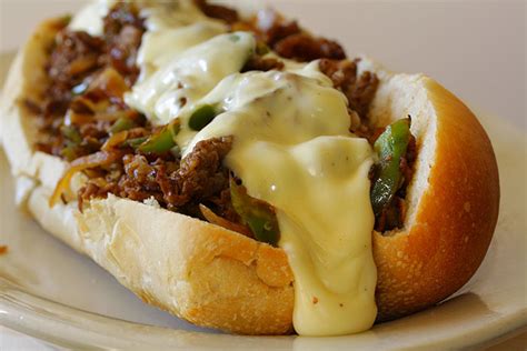 slow-cooker-philly-cheese-steak-sandwiches-the image