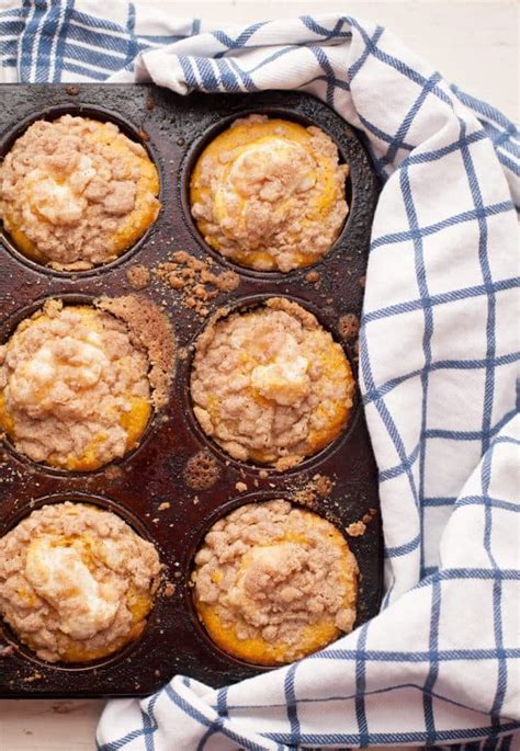 pumpkin-cupcakes-with-cream-cheese-filling-feast-and image