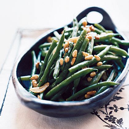garlicky-green-beans-with-pine-nuts-recipe-myrecipes image