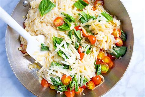 orzo-pasta-with-tomatoes-basil-and-parmesan image