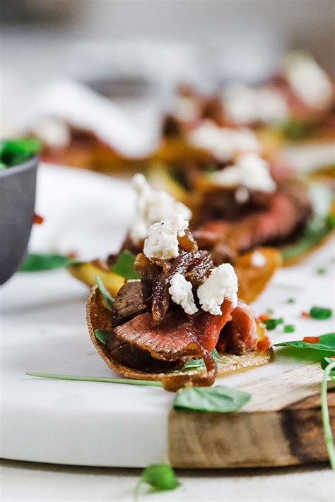 steak-appetizer-with-caramelized-onion-and-boursin image