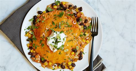 slow-cooker-chicken-enchilada-casserole-purewow image