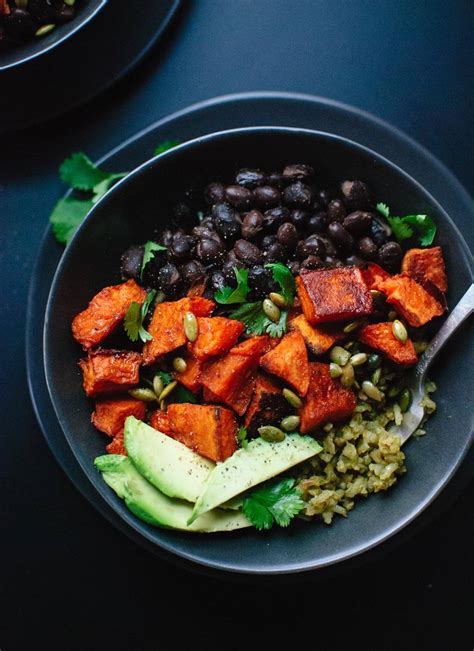 spicy-sweet-potato-and-green-rice-burrito-bowls image