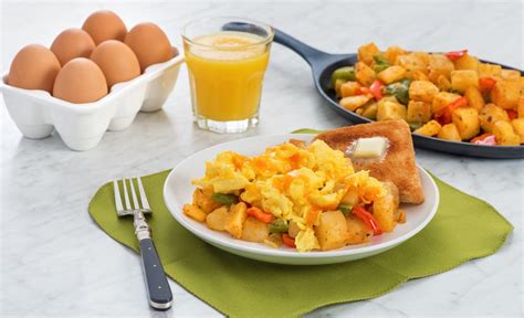 cheesy-scrambled-eggs-with-hash-browns-get-cracking image