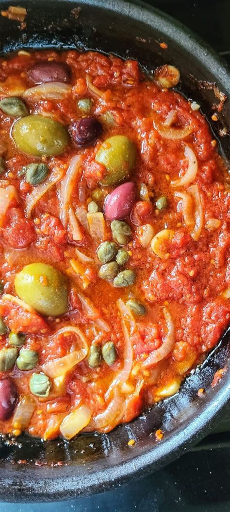 pan-seared-fish-in-tomato-caper-olive-sauce image