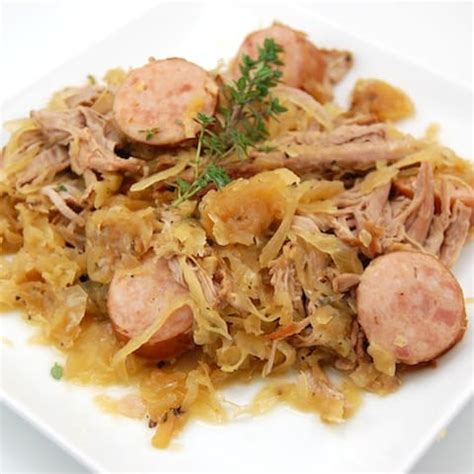 pork-roast-with-sauerkraut-and-kielbasa-sweet-peas image