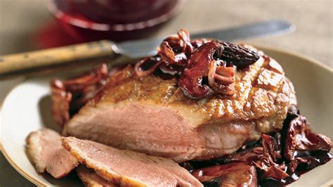 sauted-duck-breasts-with-wild-mushrooms image