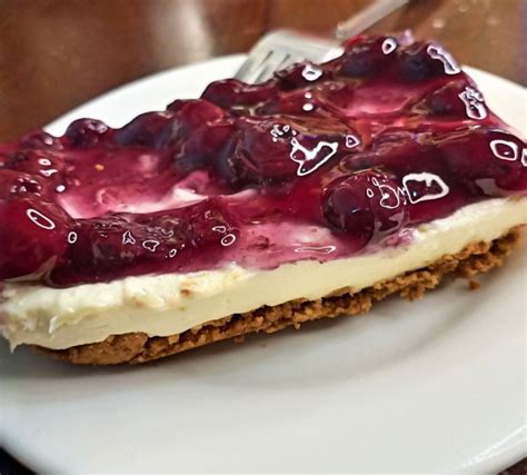 low-carb-blueberry-cheesecake-with-nut-crust-keto image