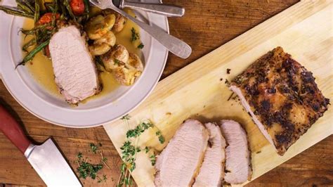 roast-pork-loin-with-crispy-potatoes-and-green-beans image