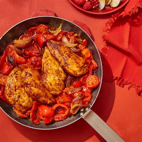 chicken-with-stewed-peppers-and-tomatoes-womans-day image