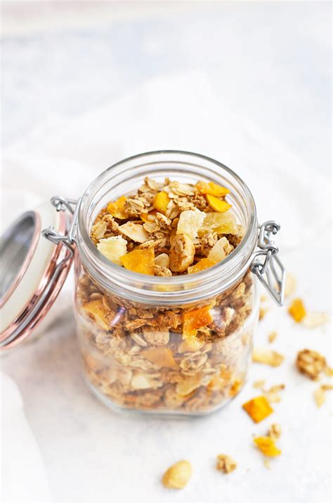 tropical-coconut-granola-with-mango-and-pineapple image