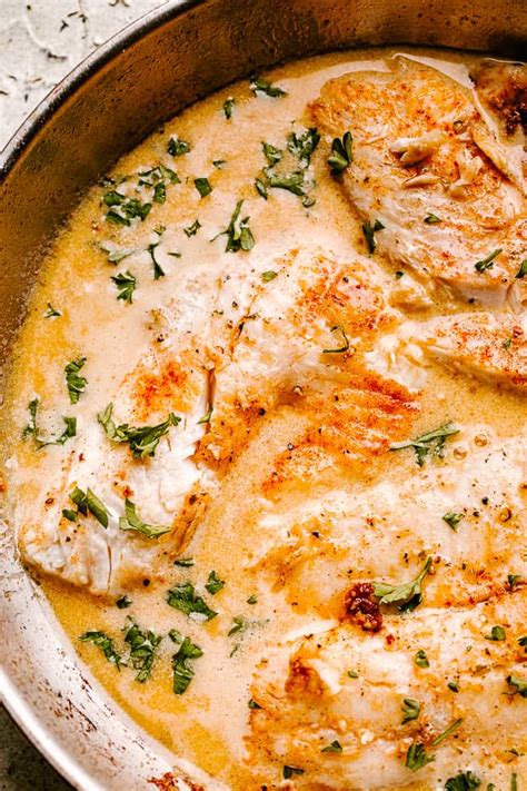 tilapia-with-creamy-lemon-sauce-how-to-cook-tender image