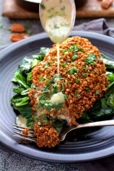 baked-catfish-pecan-meuniere-with-spicy-sauteed-greens image
