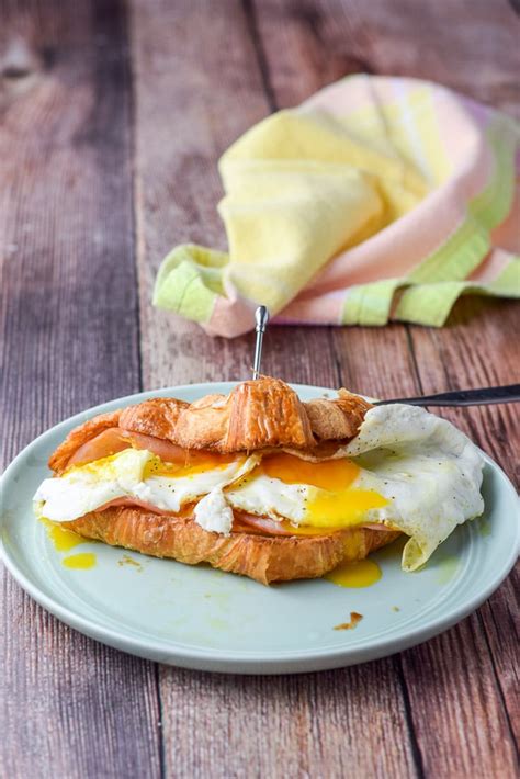 croissant-sandwich-with-ham-eggs-cheese image