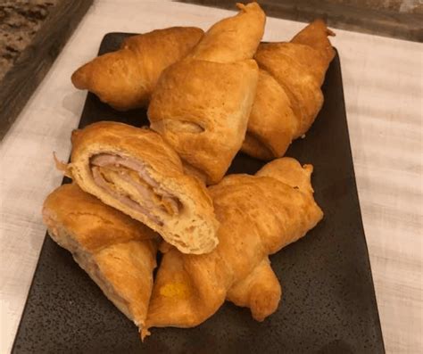 air-fryer-ham-and-cheese-crescent-rolls-fork-to-spoon image