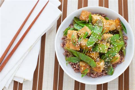 seared-tofu-snow-peas-with-pink-sesame-rice-blue image