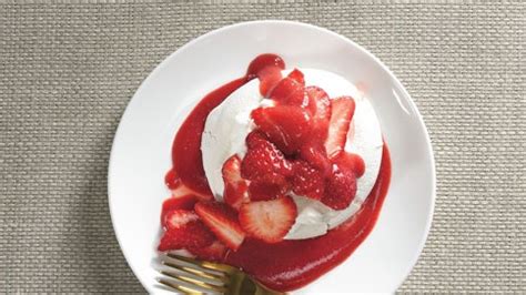 orange-flower-pavlovas-with-strawberries-recipe-bon image