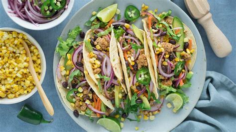 turkey-and-black-bean-tacos-with-red-onion-salsa image