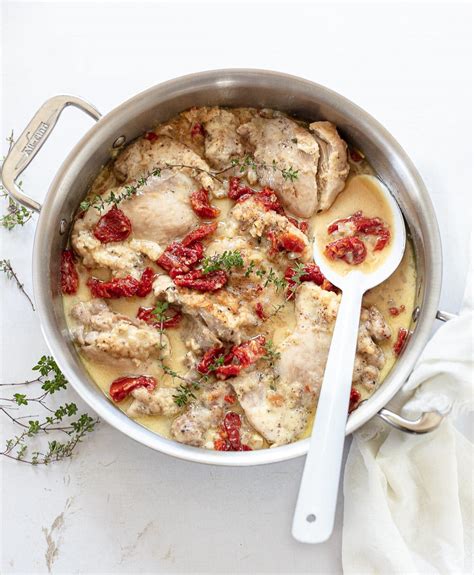 braised-chicken-thighs-in-white-wine-sauce-familystyle image