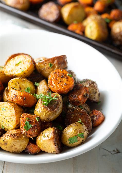 herb-oven-roasted-potatoes-and-carrots image