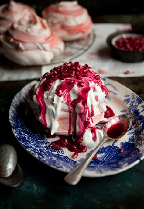 pink-swirl-meringues-with-pomegranate-syrup-drizzle image