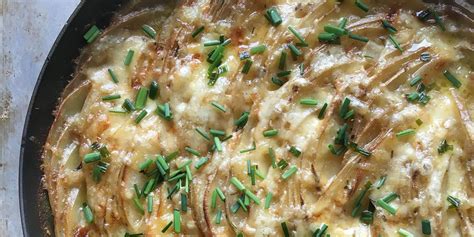skillet-scalloped-potatoes-with-chive-butter image