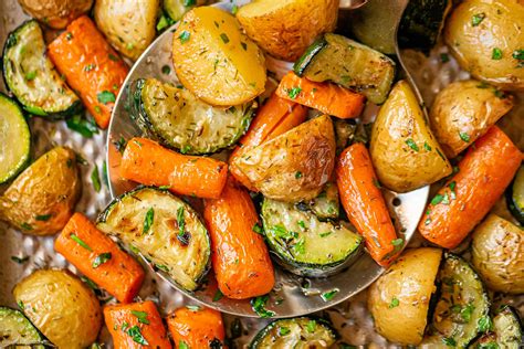 garlic-herb-roasted-potatoes-carrots-and-zucchini image