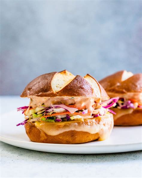 coleslaw-swiss-melt-sandwich-a-couple-cooks image