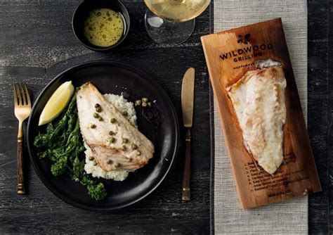 oven-planked-sea-bass-with-lemon-capers-sauce image