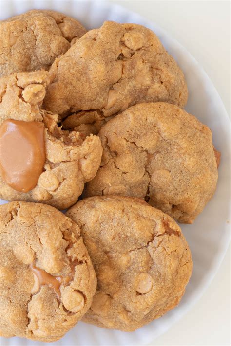 these-surprising-caramel-stuffed-peanut-butter-cookies image