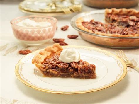 pecan-pie-with-vanilla-whipped-cream-cooking image