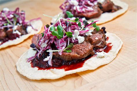 duck-tacos-with-chipotle-cherry-salsa-and-goat-cheese image