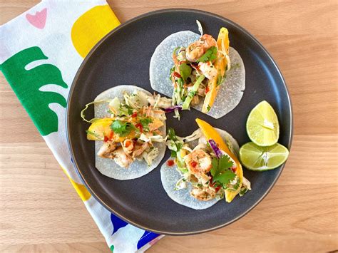 shrimp-tacos-with-mango-slaw-and-jicama-tortillas image