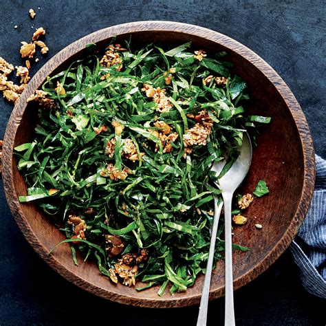 collard-greens-salad-with-ginger-and-spicy-seed-brittle image